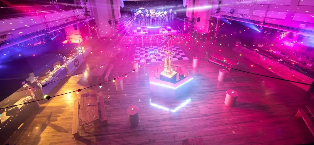 Dancefloor lit in pink and magenta before guests arrive