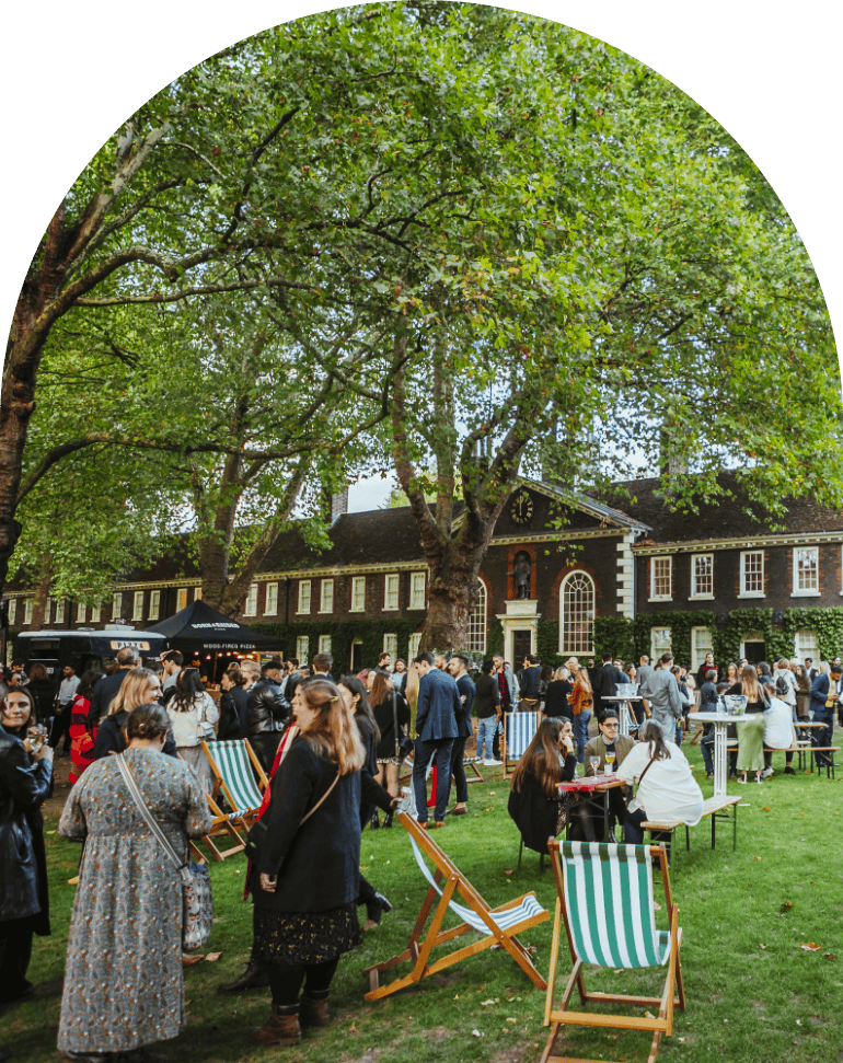 Guests relaxing on the lawn at Shoreditch Gardens