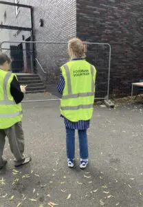 Event crew in high visibility vests working on site
