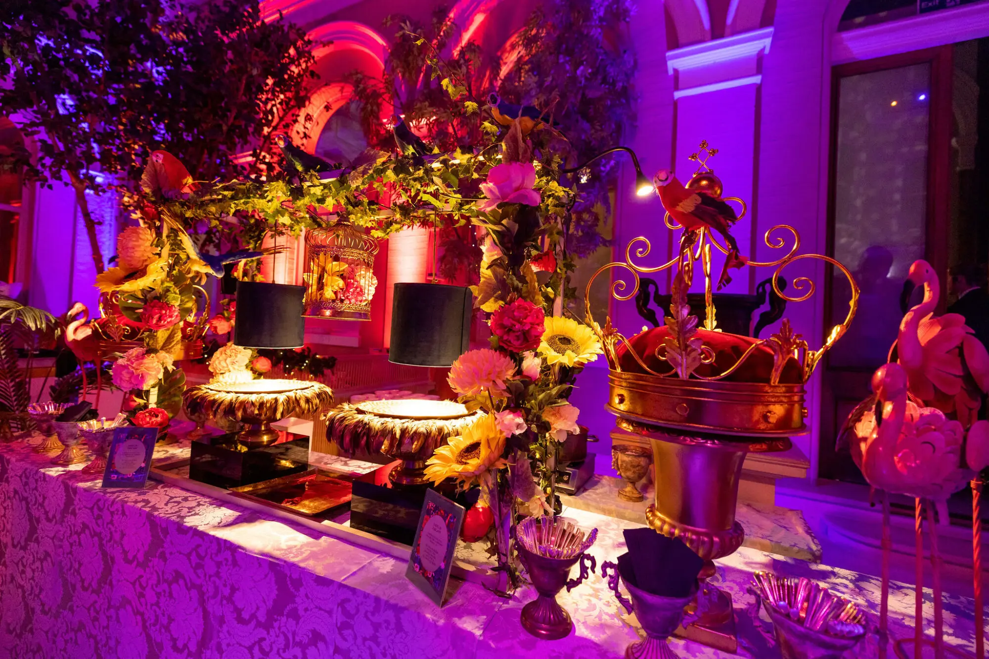 Decorated bar with table lamps and floral arrangements