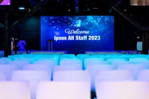 Auditorium set with illuminated seating before the Ipsos all-staff conference
