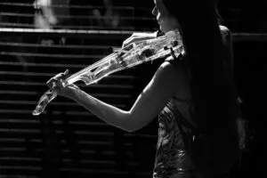 Violinist performing, photographed in black and white